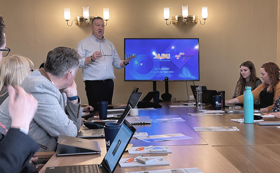 The team making a presentation in front of customers