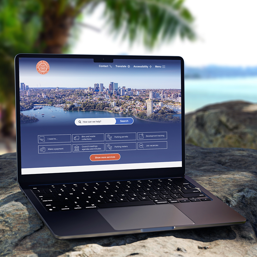 A laptop on the beach showing North Sydney Councils website